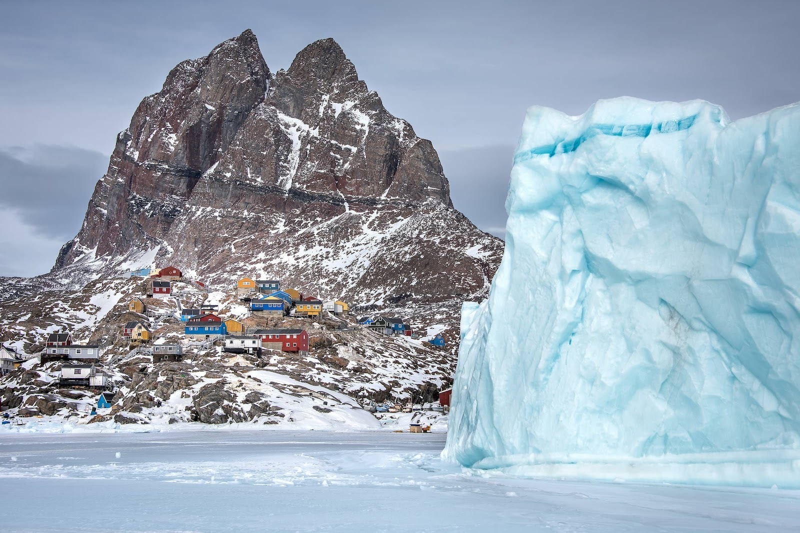 A winter view of the heart shaped mountain and the town of uummannaq in north greenland photo by marcela cardenas visit greenland